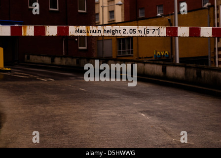 Height restriction bar leading into car park. Stock Photo