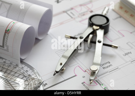Drawing compass on house plan Stock Photo