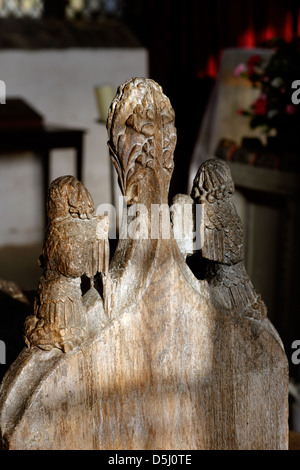 15th century poppy head finials on a pew end at St Giles Church, Holme, Newark, Nottinghamshire Stock Photo
