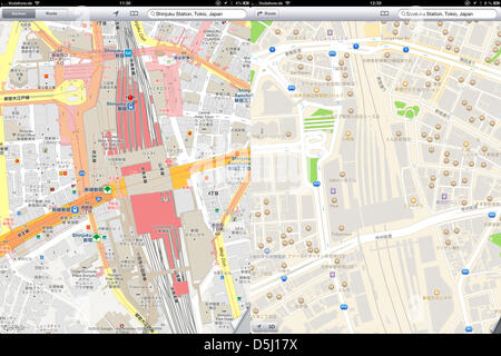 (COMBO) A composite photo shows two screenshots of maps of the area around Shinjuku Station in Tokyo on an iPhone in Berlin, Germany, 21 September 2012. On the left is the Google Maps version, on the right is the new Apple map service. With the introduction of the new iPhone 5, Apple has replaced Google Maps with their own service. Mistakes and missing details are annoying many use Stock Photo