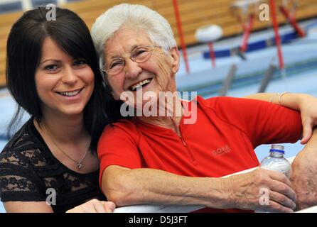 86-year-old Johanna Quaas, the world's oldest gymnast of the world, is pictured with her granddaughter Susi during her weekly training in Halle, Germany, 06 November 2012. The agile gymnast, whose birthday is on 20 November, does sport acitivities every day and still participates in competitions. As the oldest active gymnast, she is listed in the Guinness Book of World Records. Pho Stock Photo