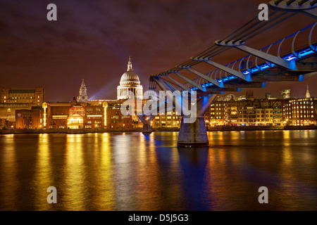 A view of St. Paul's Cathedral and the Millennium Bridge taken from Bankside, on the south side of the River Thames Stock Photo