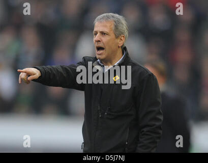 Gladbach's head coach Lucien Favre gestures form the sideline during the Bundesliga soccer match between Borussia Moenchengladbacj and VfB Stuttgart at Borussia-Park in Moenchengladbach, Germany, 17 November 2012. Photo: FEDERICO GAMBARINI  (ATTENTION: EMBARGO CONDITIONS! The DFL permits the further  utilisation of up to 15 pictures only (no sequntial pictures or video-similar seri Stock Photo