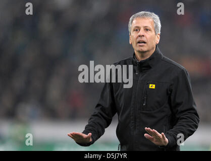 Gladbach's head coach Lucien Favre gestures during the Bundesliga soccer match between Borussia Moenchengladbach and VfB Stuttgart at Borussia-Park in Moenchengladbach, Germany, 17 November 2012. Photo: FEDERICO GAMBARINI  (ATTENTION: EMBARGO CONDITIONS! The DFL permits the further  utilisation of up to 15 pictures only (no sequntial pictures or video-similar series of pictures all Stock Photo