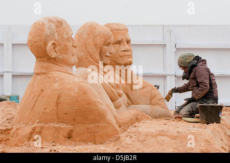 Brighton, UK. 3rd April 2013. Brighton Sand Sculpture Festival 2013:   X-Factor judges, (l to r), Louis Walsh, Cheryl Cole and Simon Cowell. Credit: Andrew Hasson / Alamy Live News Stock Photo