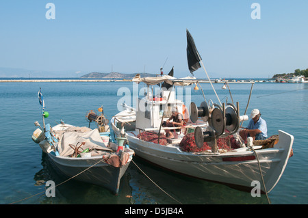 Fishing boats in the old harbour at Limenas Thassos Town Stock Photo