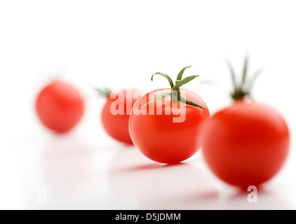 Mini cherry tomatoes isolated on white background Stock Photo