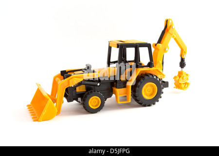 Toy yellow tractor on a white background Stock Photo