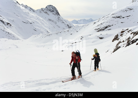 Two mountaineers on a ski track from Essener und Rostocker Hutte to Simonyspitze, Venediger group, Hohe Tauern, Austria. Stock Photo