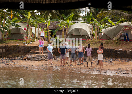 Madagascar, Nosy Be, Marodokana, Operation Wallacea staff on shore at diving camp Stock Photo