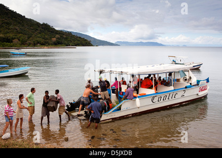 Madagascar, Nosy Be, Marodokana, Operation Wallacea students and luggage arriving at diving camp Stock Photo