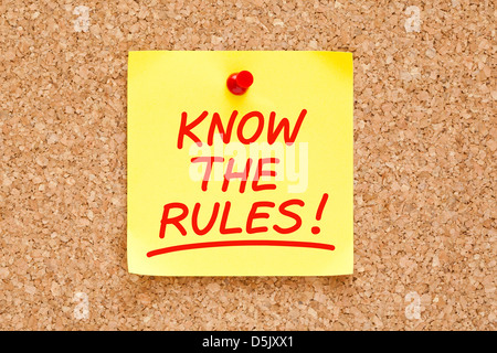 Know The Rules written on yellow sticky note with red marker. Stock Photo