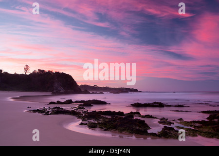 A beautiful sunset on Glasshouse Beach near Narooma, NSW, Australia Stock Photo