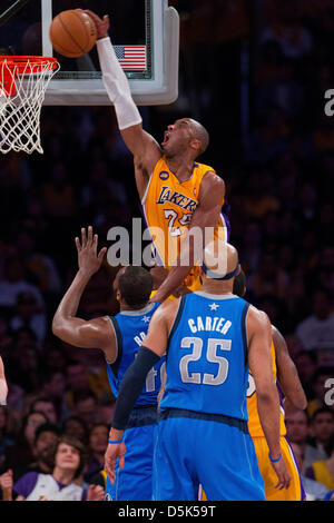 Los Angeles, California, USA. 2nd April 2013. Guard (24) Kobe Bryant of the Los Angeles Lakers dunks the ball against the Dallas Mavericks during the first half of the Lakers 101-81 victory over the Mavericks at the STAPLES Center in Los Angeles, CA. Credit: Action Plus Sports Images / Alamy Live News Stock Photo
