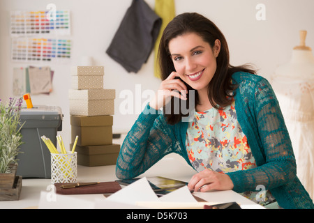 Fashion designer working in studio Stock Photo