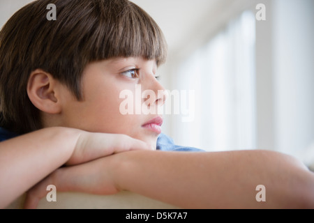 Portrait of pensive boy (8-9) Stock Photo