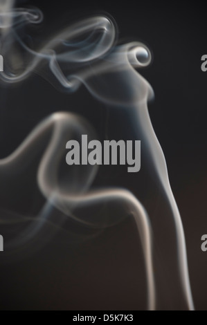 Studio shot of some smoke on a black background Stock Photo - Alamy