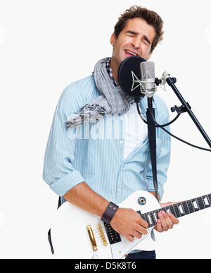 Studio shot of man singing Stock Photo