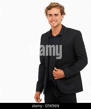 Studio Shot of young man wearing black jacket and shirt Stock Photo