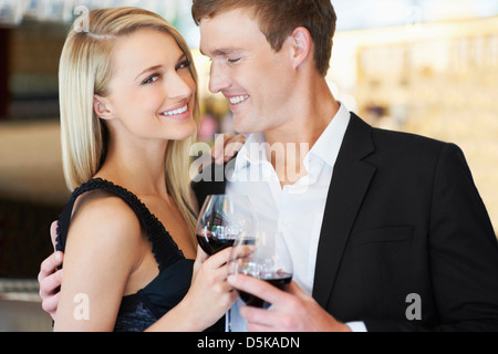 Couple drinking wine in restaurant Stock Photo