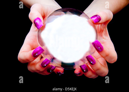 Orb with two hands on black background Stock Photo