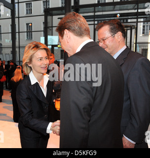 Ursula von der Leyen and Guido Westerwelle at manager meeting ofgerman telekom at Atrium. Berlin, Germany - 06.04.2011.