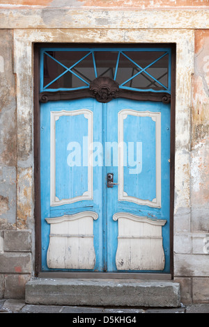 Blue wooden door of old building in Tallinn, Estonia Stock Photo
