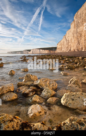 Stunning Summerr sunset over ocean with rocks and vibrant colors Stock ...