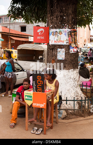 Madagascar, Nosy Be, Hell-Ville, Bld Gen De Gaulle, Telma and Orange mobile phone sim card and top up stall Stock Photo