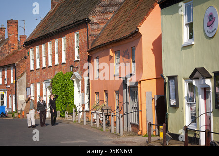 UK; NORFOLK; ENGLAND; BURNHAM MARKET; VILLAGE; SUMMER; NORTH NORFOLK; STREET; WALKING Stock Photo