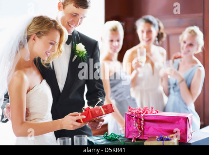 South Africa, Cape Town, Wedding couple opening gifts Stock Photo