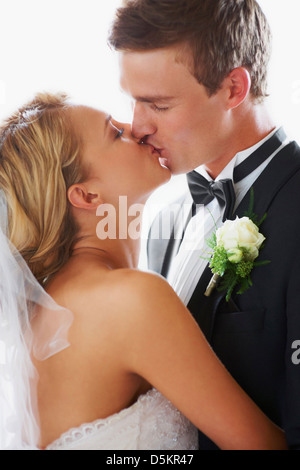 Bride and groom kissing Stock Photo