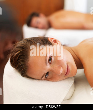 Two people getting massage in spa Stock Photo
