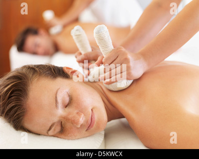 Two people getting massage in spa Stock Photo