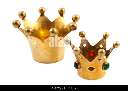 Two golden crowns isolated on a white background Stock Photo