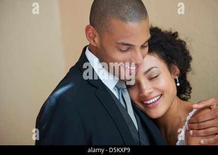 Bride and groom embracing Stock Photo