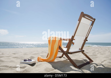 Sun chair on sandy beach Stock Photo