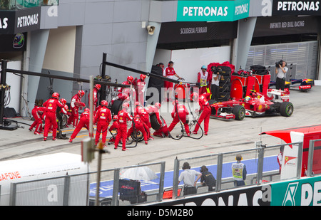 Felipe Massa of Team Ferrari enters pit for tyres at Malaysian F1 GP Stock Photo