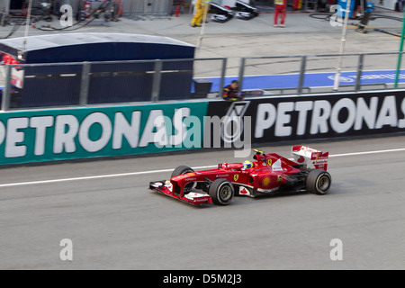 Brazilian Felipe Massa of Ferrari Racing team down the main straight at the Petronas Malaysian Formula 1 GP Stock Photo