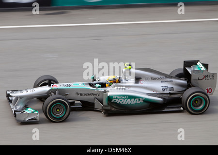 Lewis Hamilton down the main straight at the Malaysian F1 GP Stock Photo