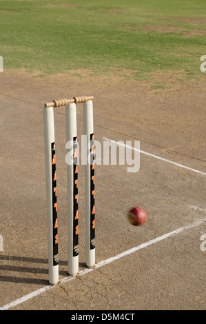 Cricket ball approaching stumps Stock Photo