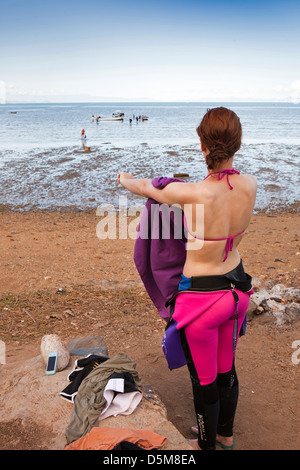 Madagascar, Nosy Be, Marodokana, Operation Wallacea scuba diving student drying after dive Stock Photo