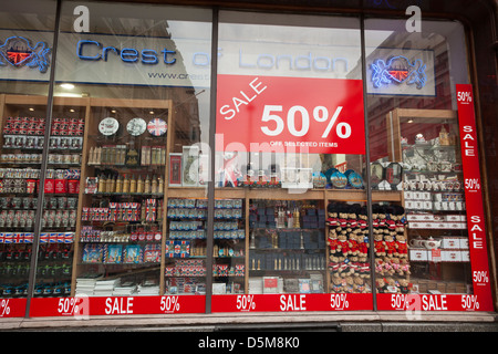 Tourist souvenirs in London shop window with 50% sale poster Stock Photo