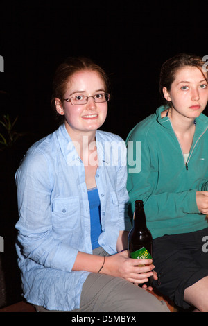 Madagascar, Nosy Be, Marodokana, Operation Wallacea student drinking low alcohol 1% abv beer Stock Photo