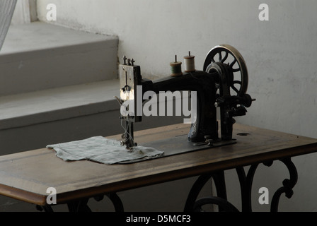 Vintage foot driven sewing machine. Stock Photo