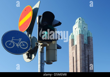 traffic lights and road signs against sky in Helsinki Stock Photo