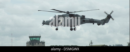 Royal Navy Army AgustaWestland future Lynx Wildcat AW159 helicopter hovering at an airshow on armed forces day Stock Photo