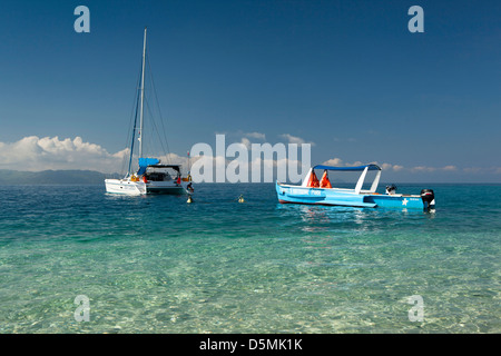 Madagascar, Nosy Be, Nosy Tanikely, main beach, national park boat Stock Photo