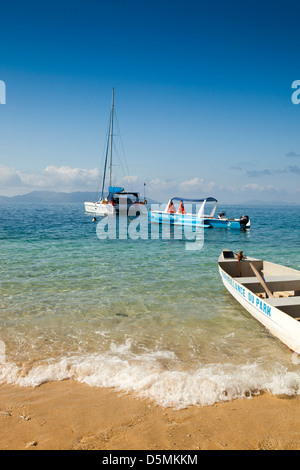 Madagascar, Nosy Be, Nosy Tanikely, national park boats moored at main beach Stock Photo