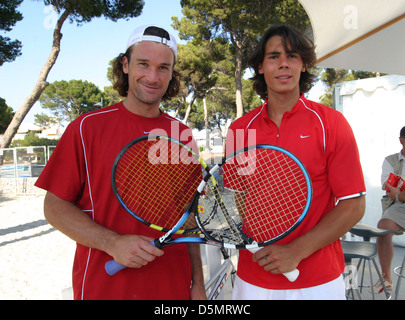 Rafa Nadal and Carlos Moya pose before a tennis tournament match in the Spanish island of Majorca Stock Photo